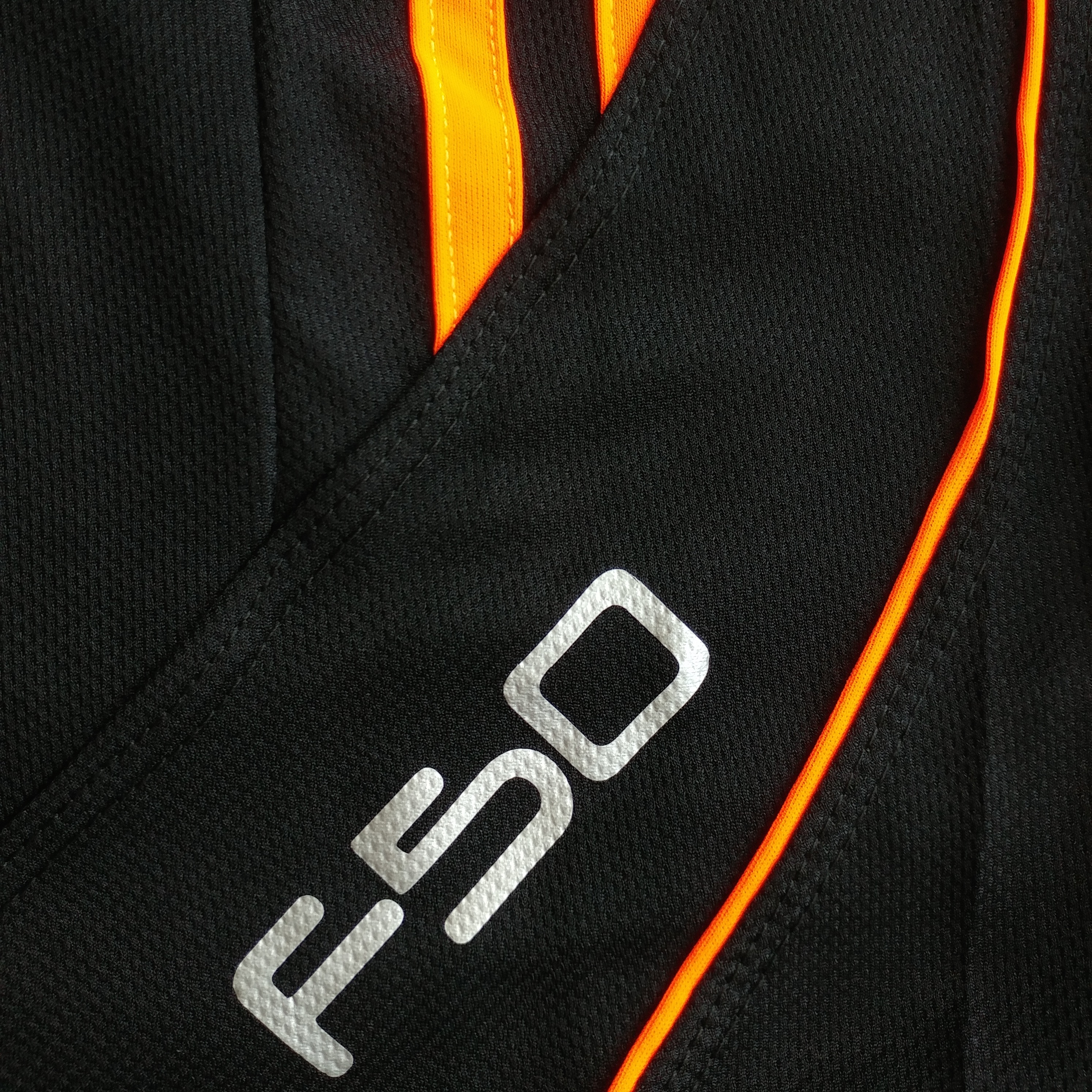 PANTS F50 Holand Negro Naranja Neon Tela Pants deportivos hombre. Negro Naranja Neon. Ropa deportiva hombre. Tienda para hombres.